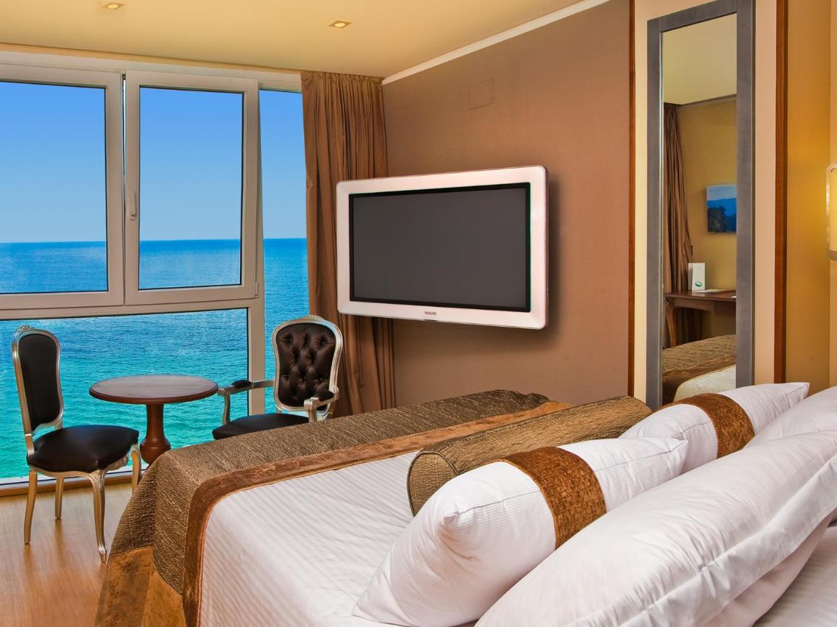 Una televisión o centro de entretenimiento en Hotel Boutique Villa Venecia