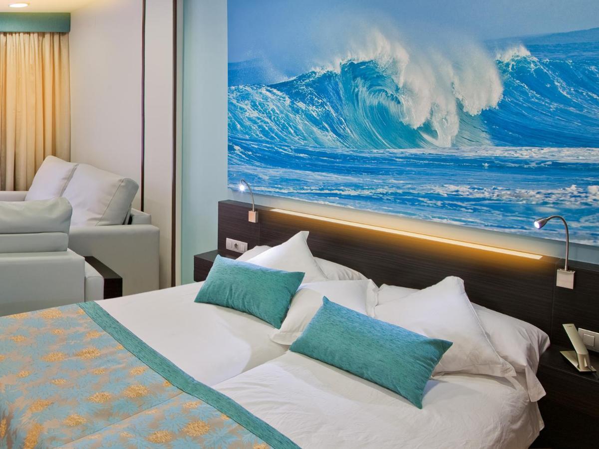 Cama o camas de una habitación en Hotel Villa del Mar
