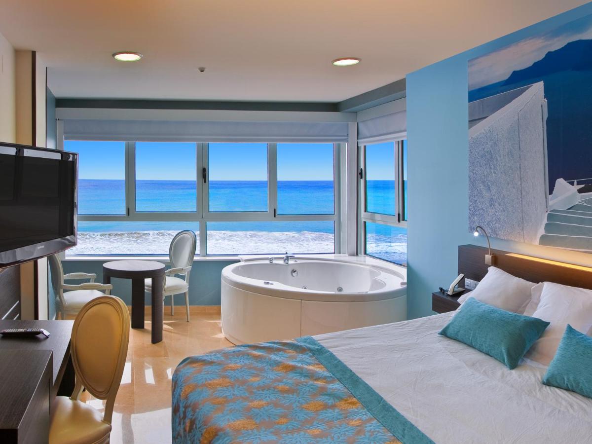 Cama o camas de una habitación en Hotel Villa del Mar