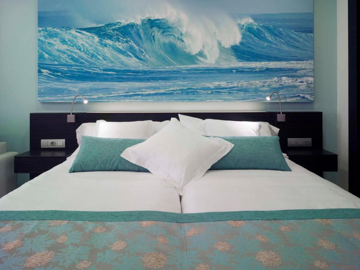 Cama o camas de una habitación en Hotel Villa del Mar