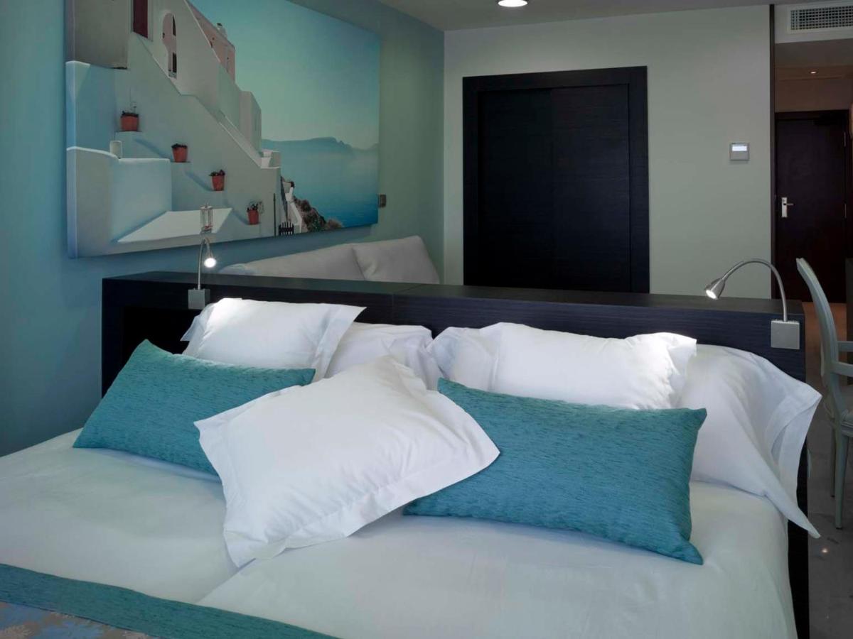 Cama o camas de una habitación en Hotel Villa del Mar