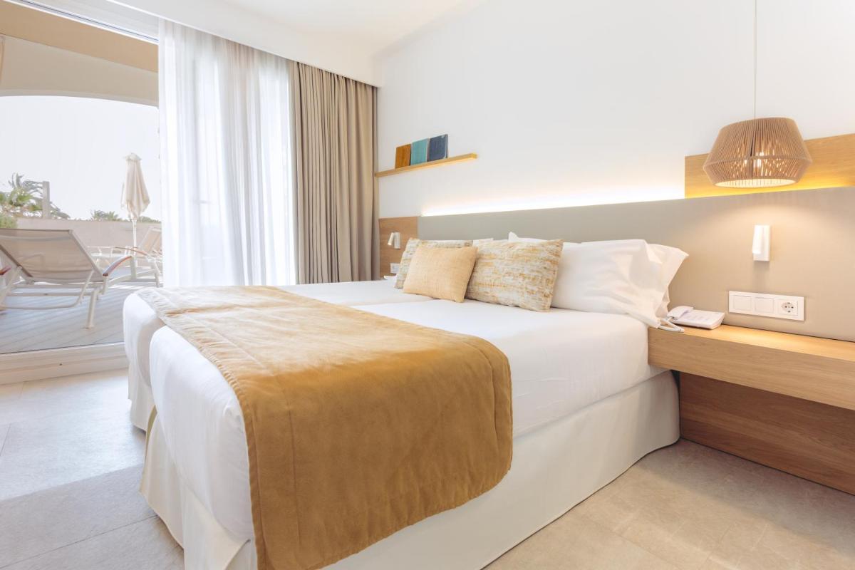 Cama o camas de una habitación en Myseahouse Flamingo - Adults Only 4* Sup