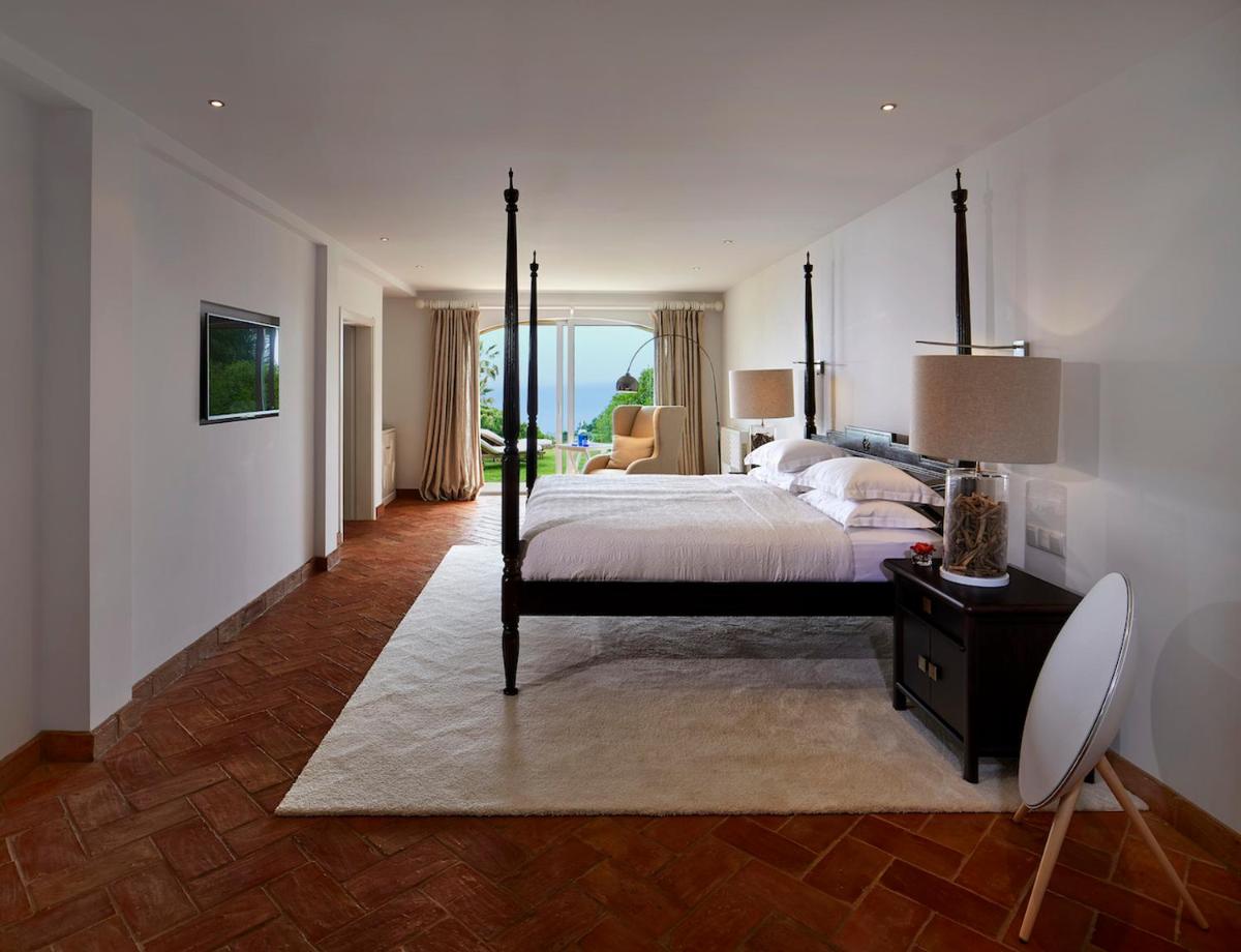Uma cama ou camas num quarto em Vila Joya
