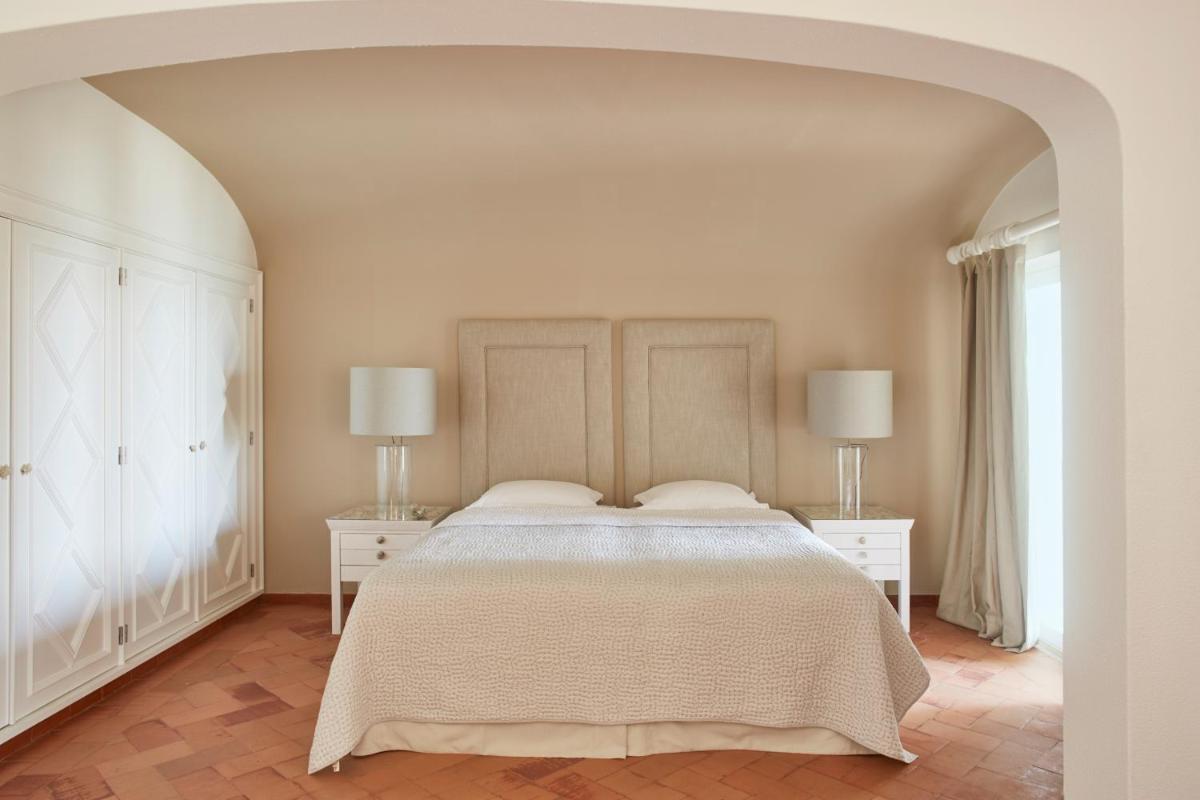 Uma cama ou camas num quarto em Vila Joya