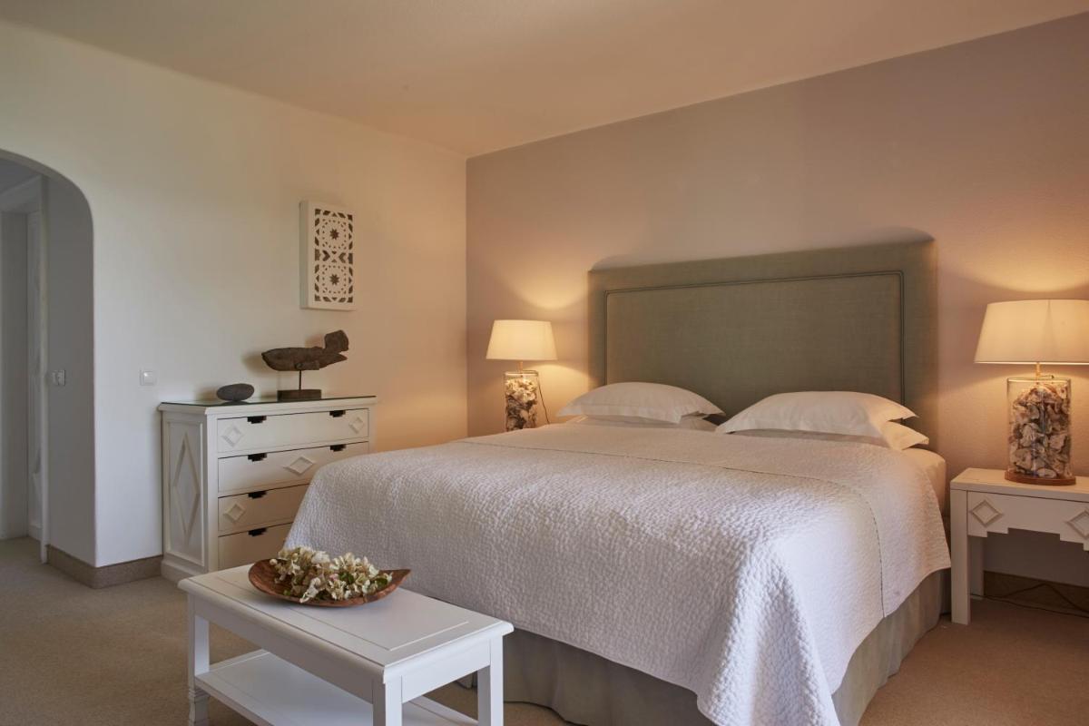Uma cama ou camas num quarto em Vila Joya