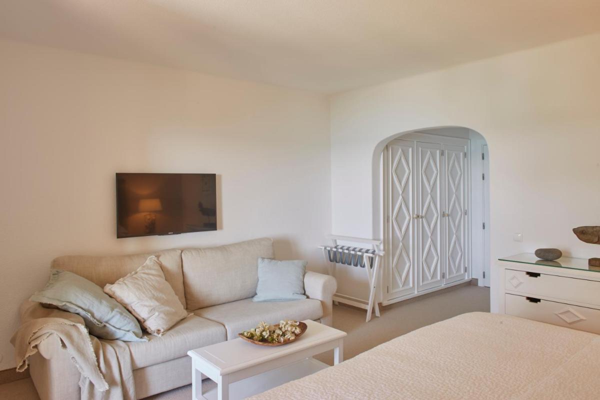 Uma cama ou camas num quarto em Vila Joya