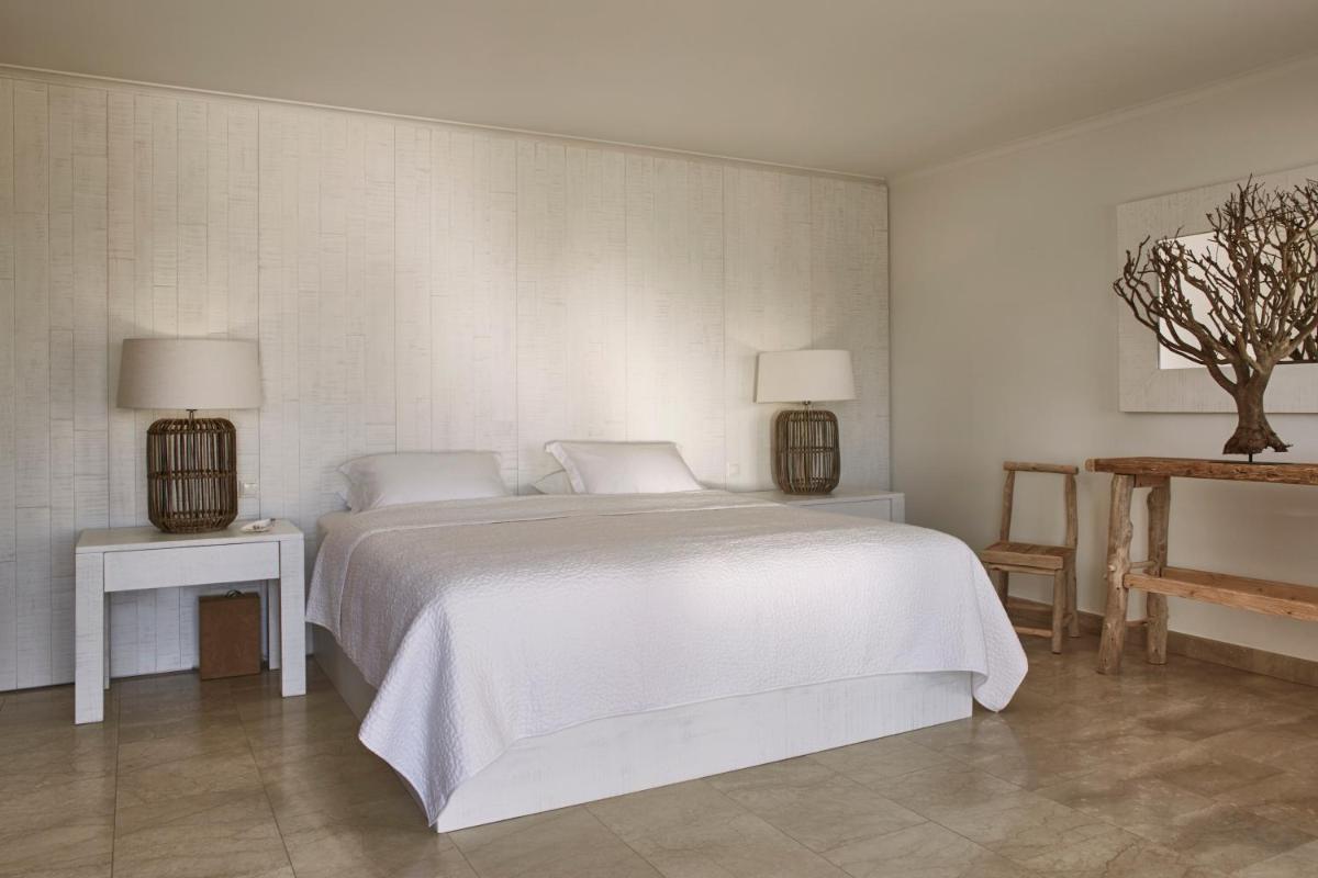 Uma cama ou camas num quarto em Vila Joya