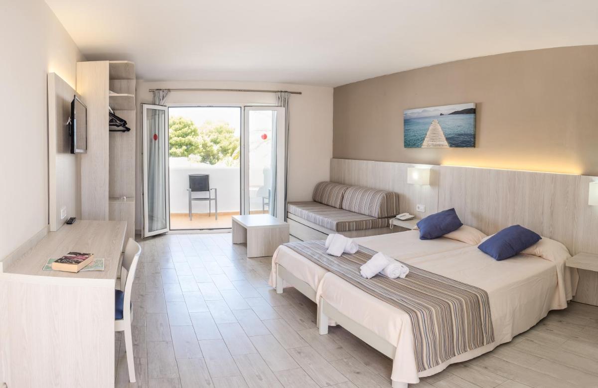 Zona de estar de Hotel Club Es Talaial