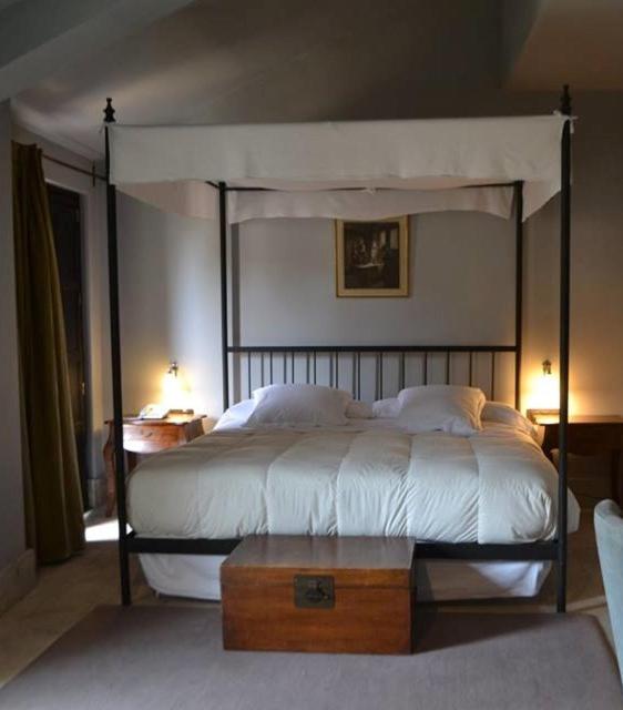 Cama o camas de una habitación en Hotel Palacio de Mengibar