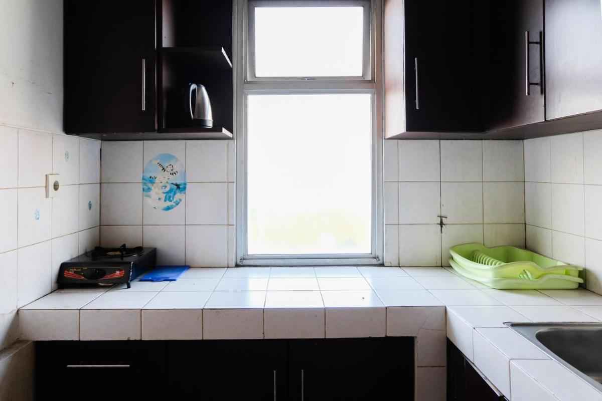 2BR Apartment at 18th Floor Great Western By Travelio - Housity