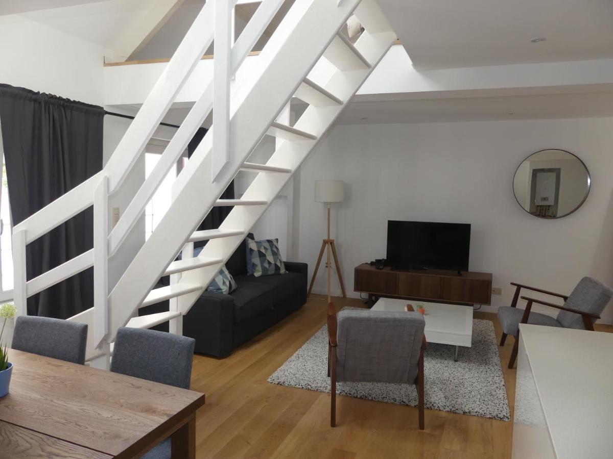 Ilot Sacre Apartments - Housity