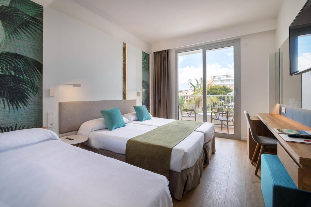 Cama o camas de una habitación en JS Yate