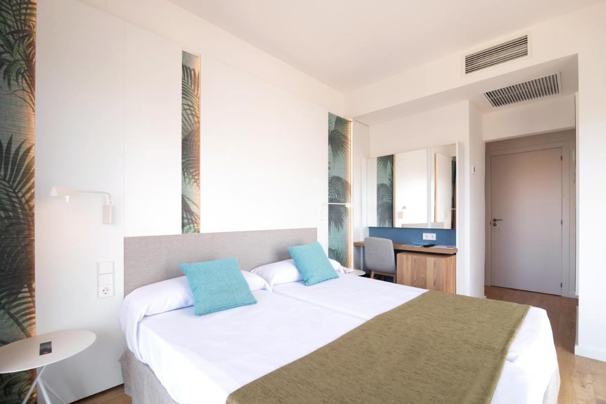 Cama o camas de una habitación en JS Yate