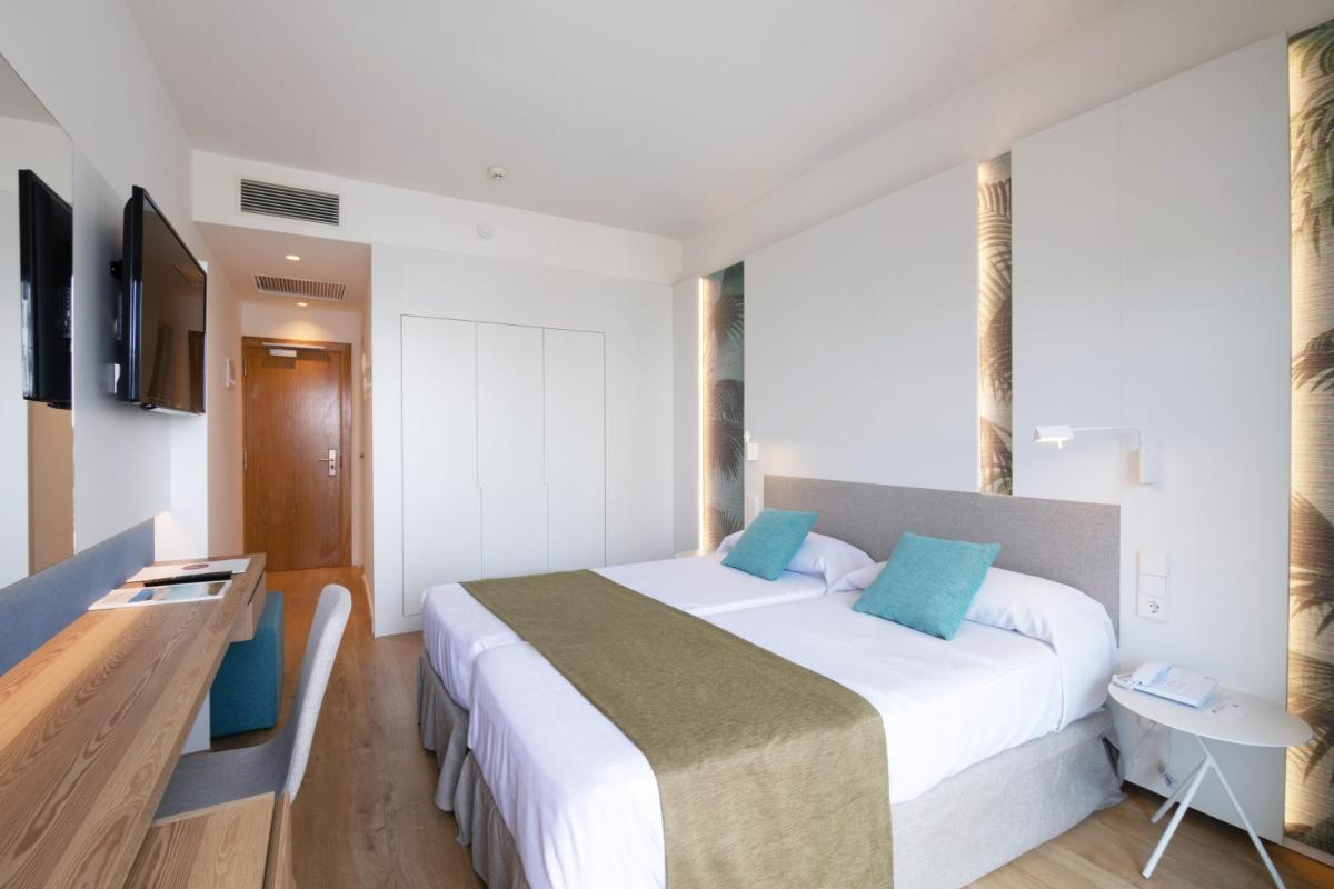 Cama o camas de una habitación en JS Yate
