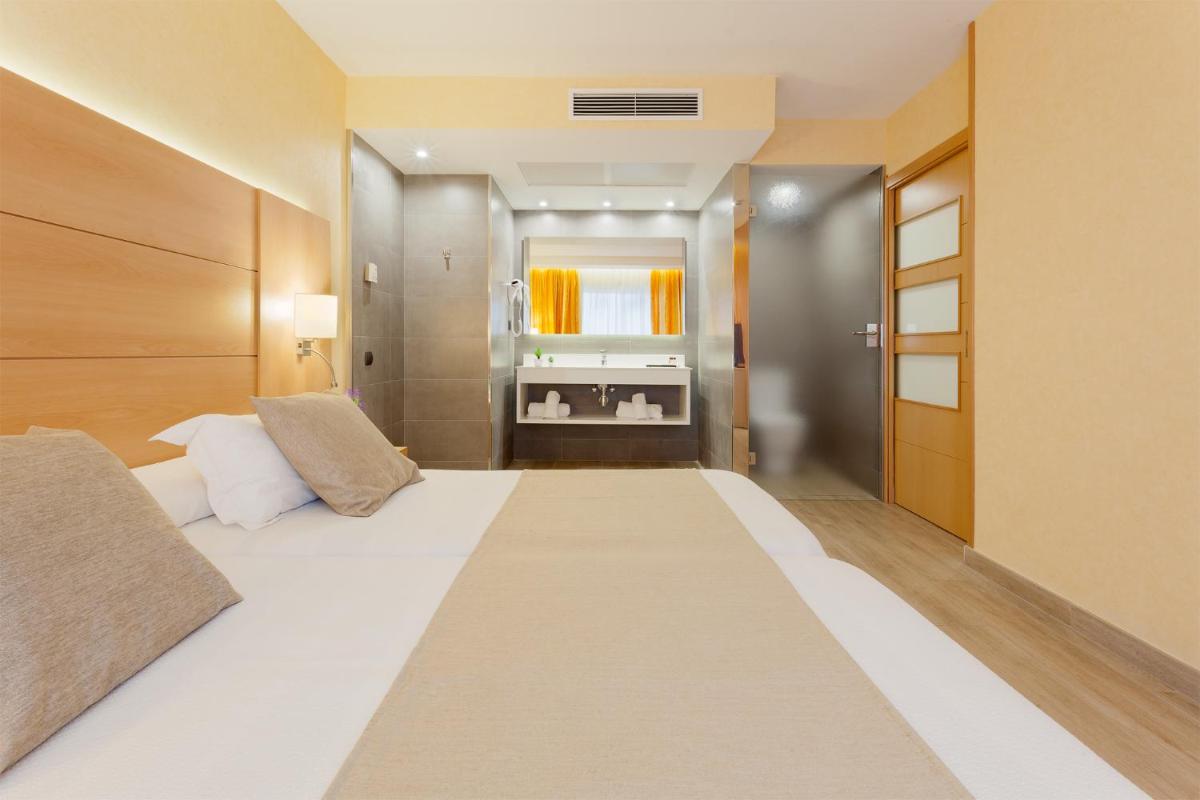 Cama o camas de una habitación en Hotel Pimar & Spa