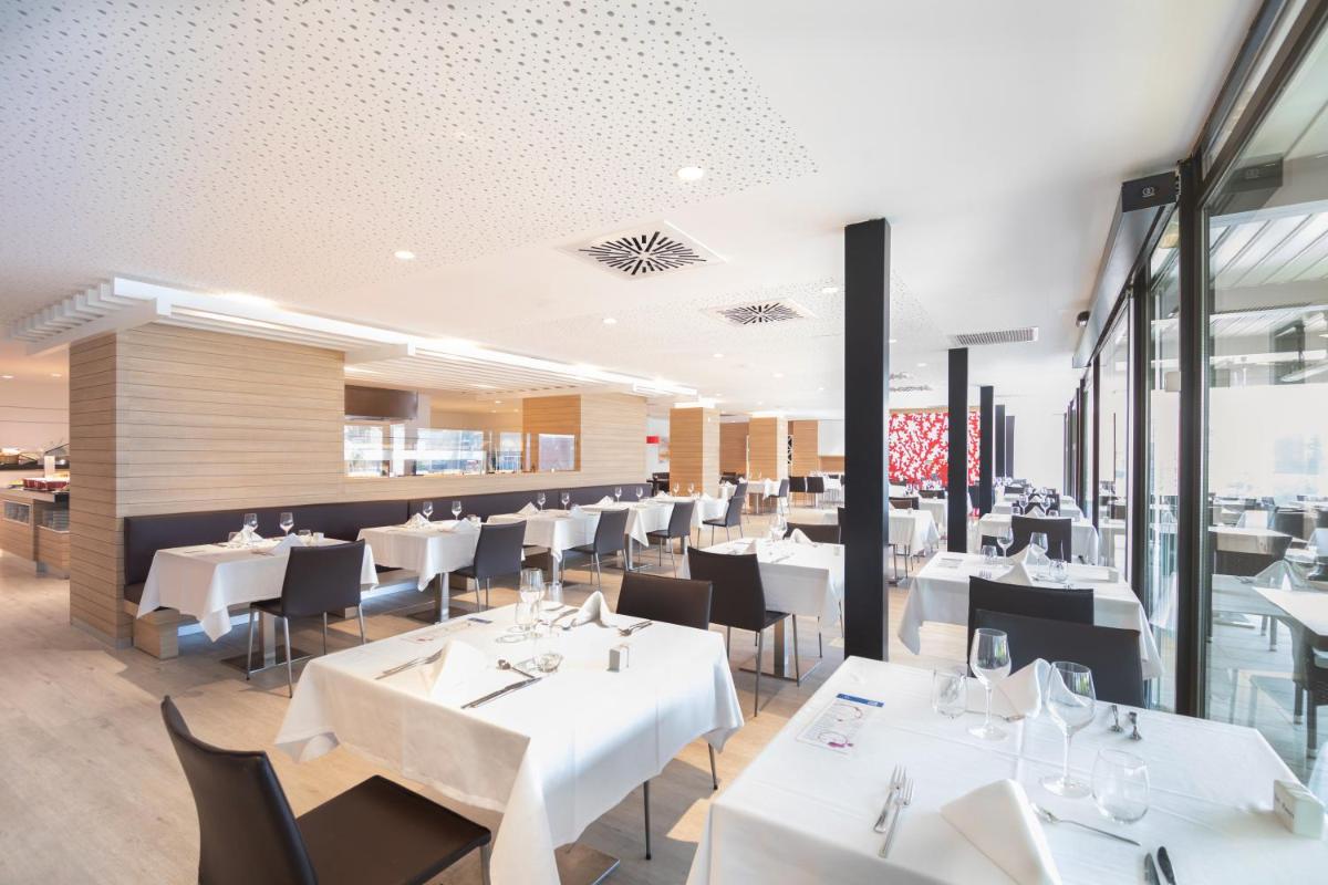 Un restaurante o sitio para comer en Isla Mallorca & Spa