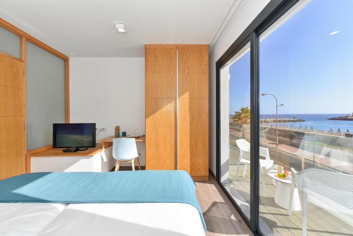 BeachFront Suites Morea Puerto Rico by VillaGranCanaria - Housity