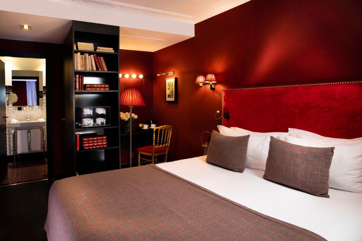 Un ou plusieurs lits dans un hébergement de l'établissement Hotel Monsieur & Spa