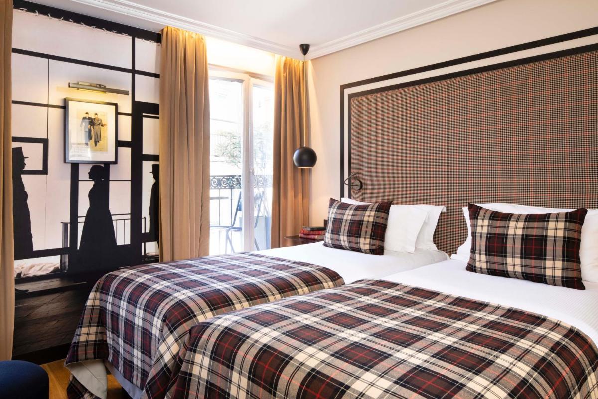 Un ou plusieurs lits dans un hébergement de l'établissement Hotel Monsieur & Spa