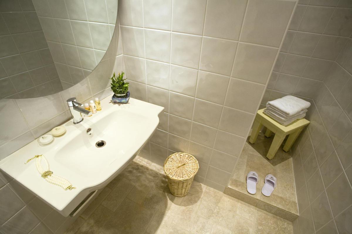 Salle de bains dans l'établissement Villa Cécile