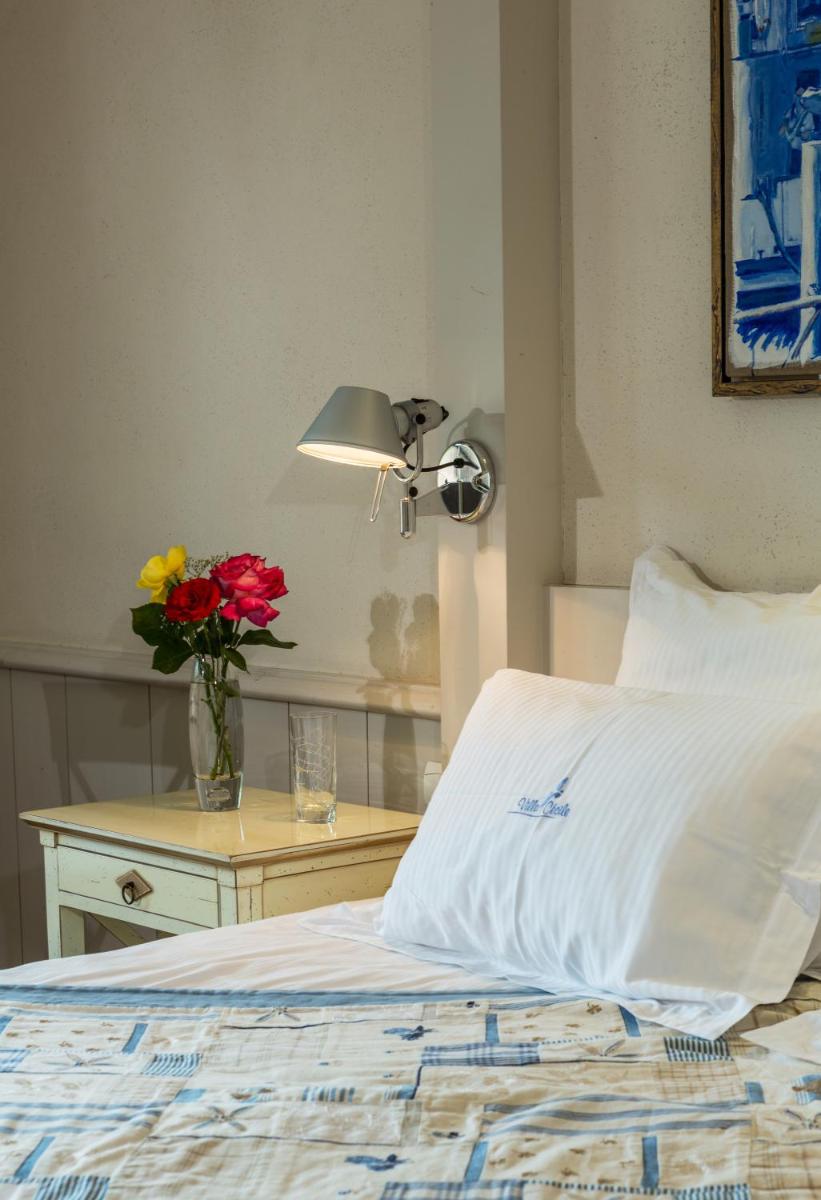 Un ou plusieurs lits dans un hébergement de l'établissement Villa Cécile