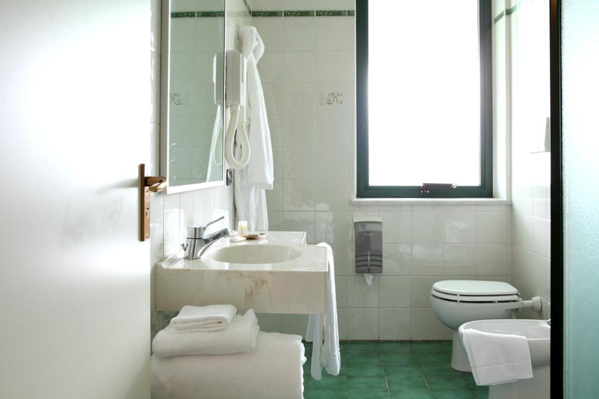 Hotel Romanisio - Housity