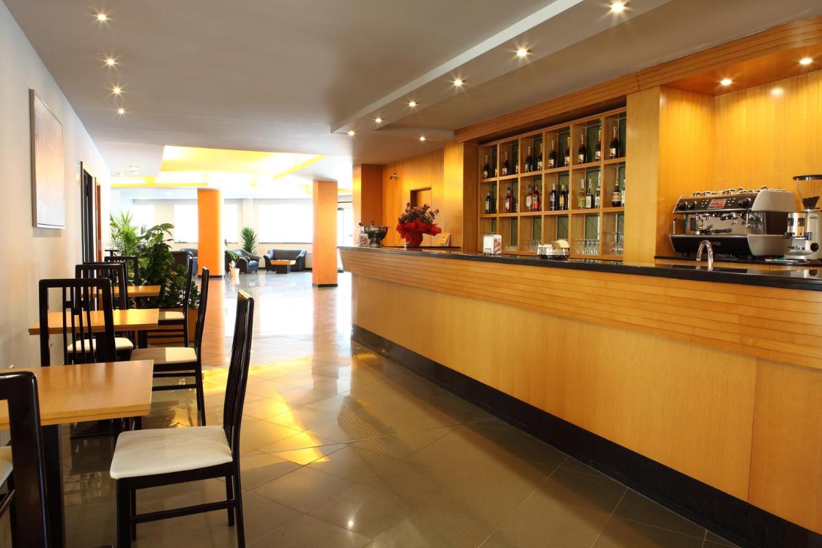 Hotel Romanisio - Housity