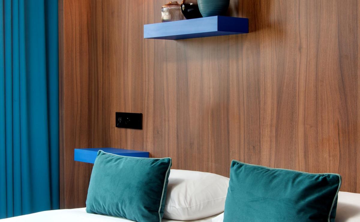 Coin salon dans l'établissement Hôtel Montmorency & Spa