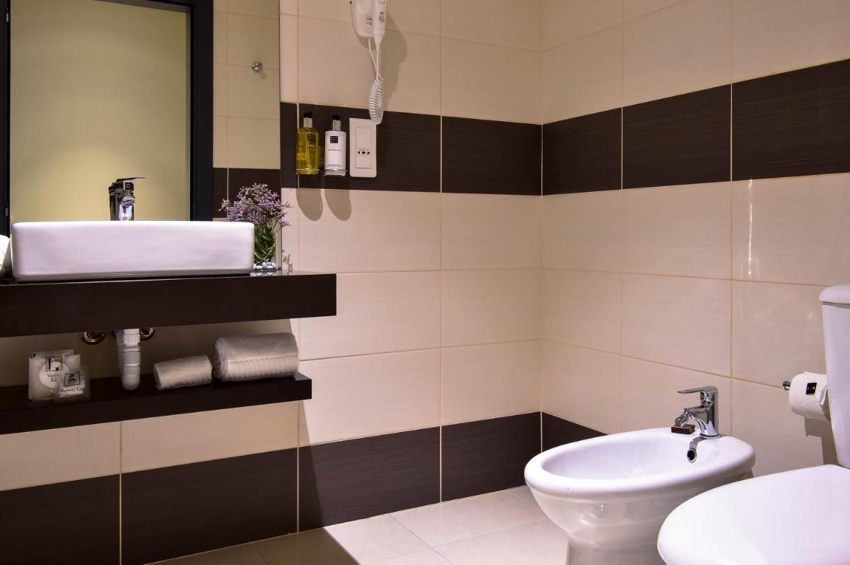 Uma casa de banho em The Prime Energize Hotel & SPA - Algarve