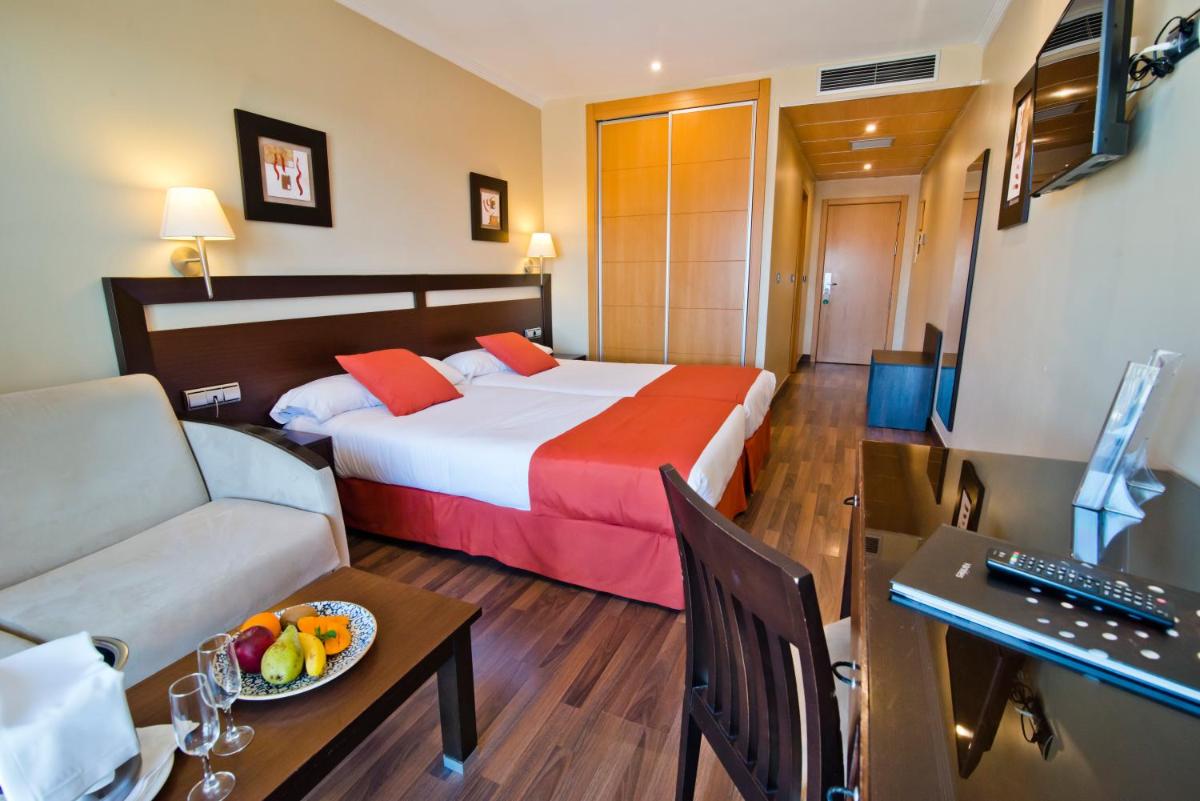 Cama o camas de una habitación en Bahía Almuñecar