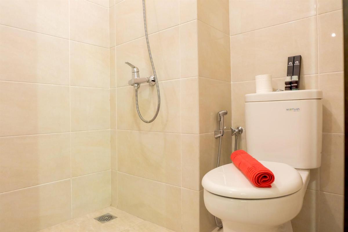Elegant Studio No Kitchen Apartment Mustika Golf Residence By Travelio - Housity