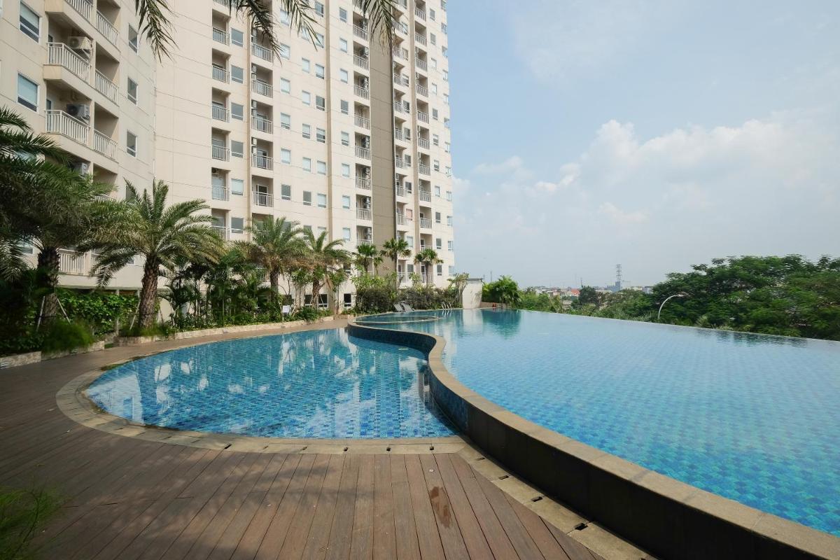 Comfy Studio Mustika Golf Apartment By Travelio - Housity