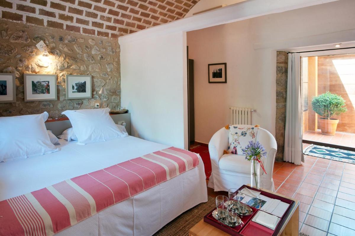 Cama o camas de una habitación en Mas Falgarona Hotel Boutique & SPA