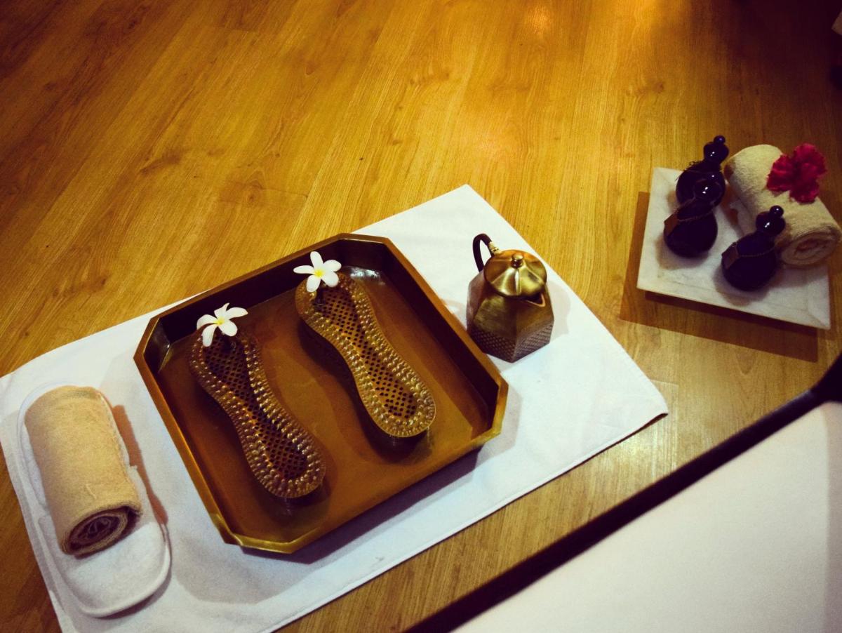 a cake with heels on it on a table at Trident Agra in Agra
