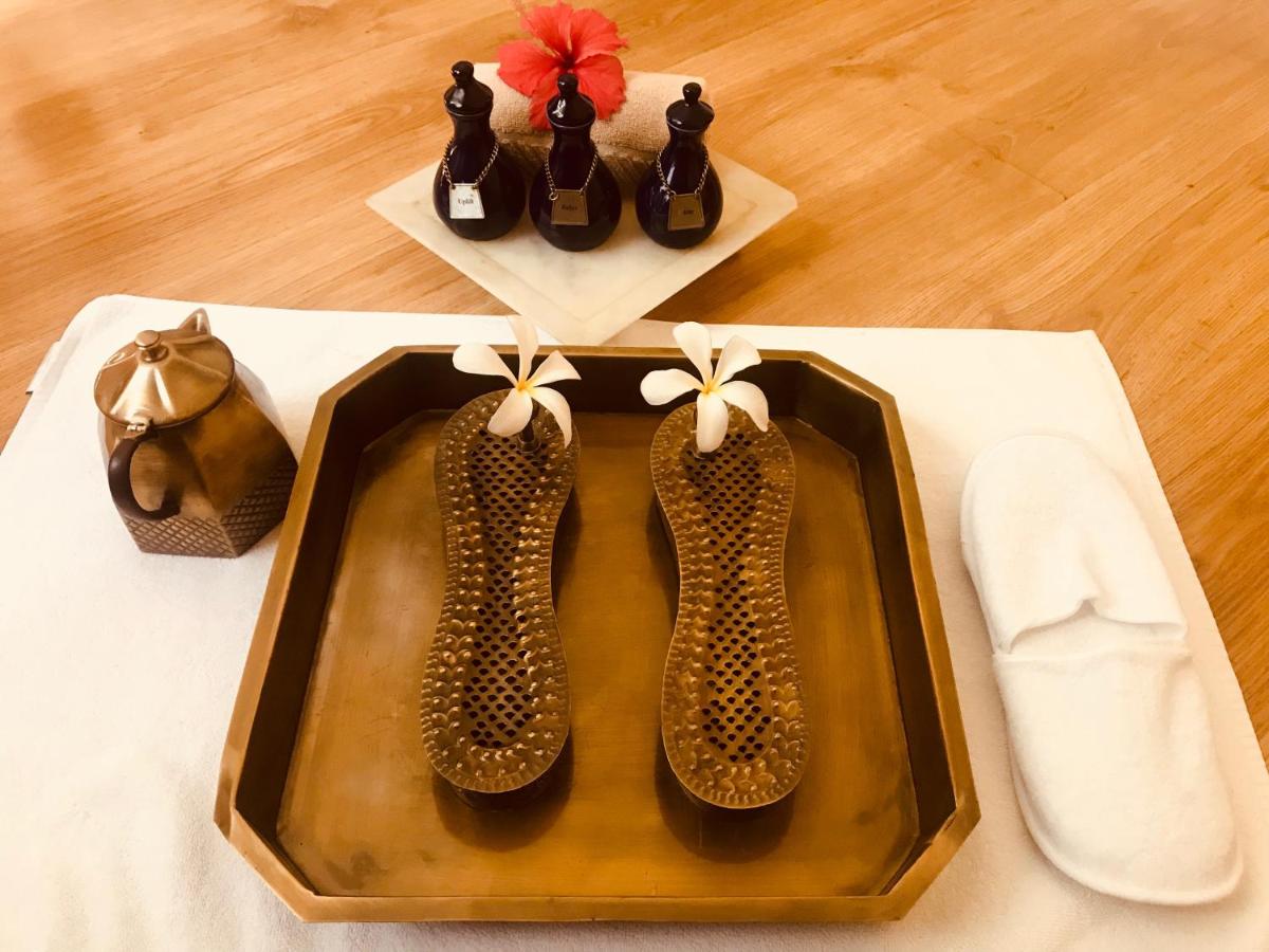 a tray with heels and shoes on a table at Trident Agra in Agra