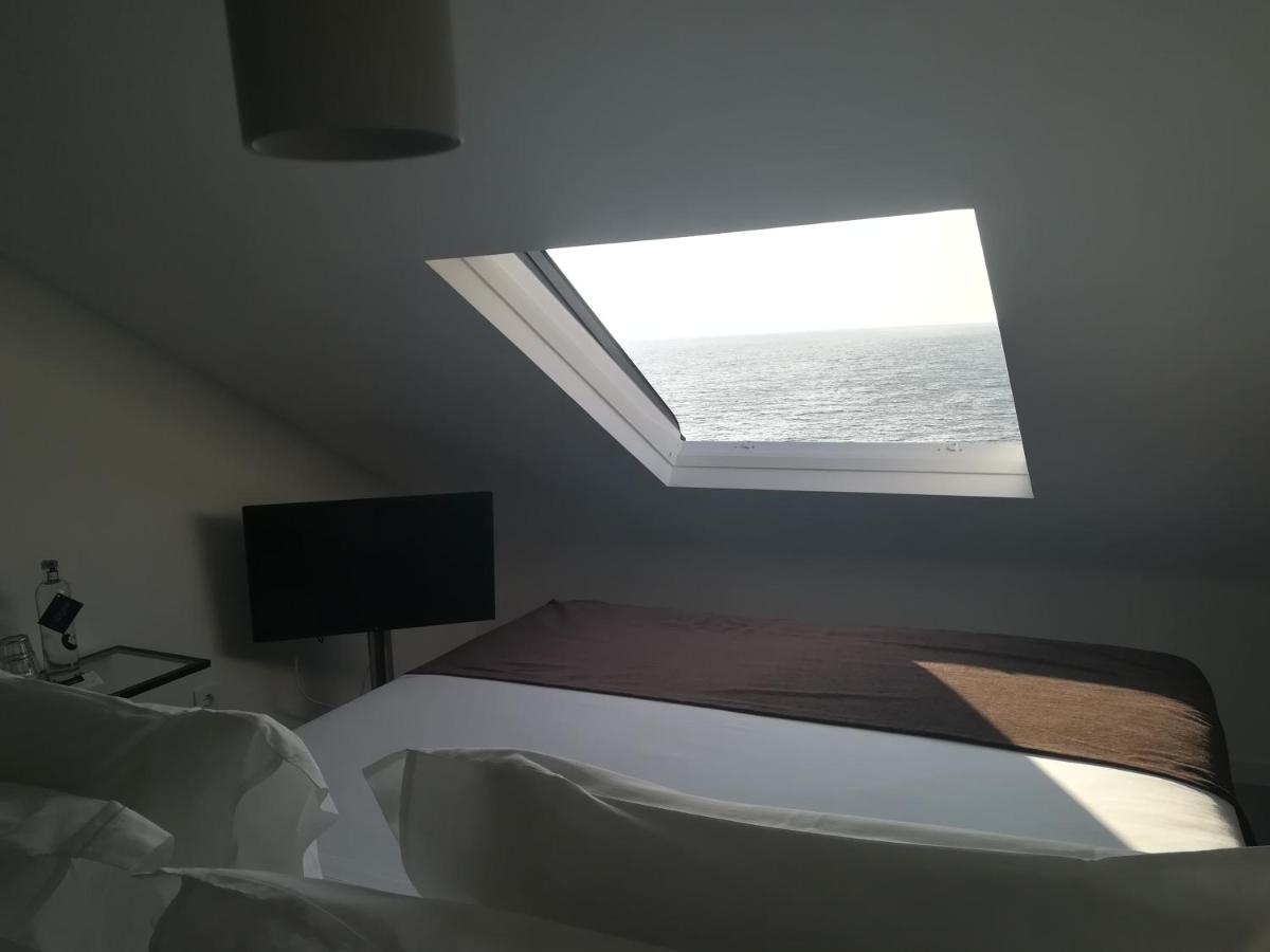 Uma cama ou camas num quarto em Promar - Eco Beach & Spa Hotel
