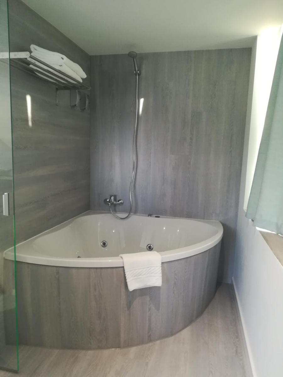 Uma casa de banho em Promar - Eco Beach & Spa Hotel