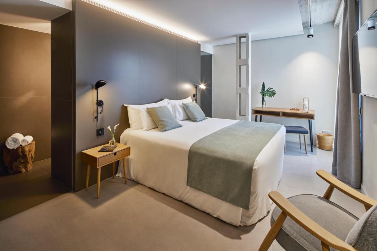 Cama o camas de una habitación en Ohla Eixample