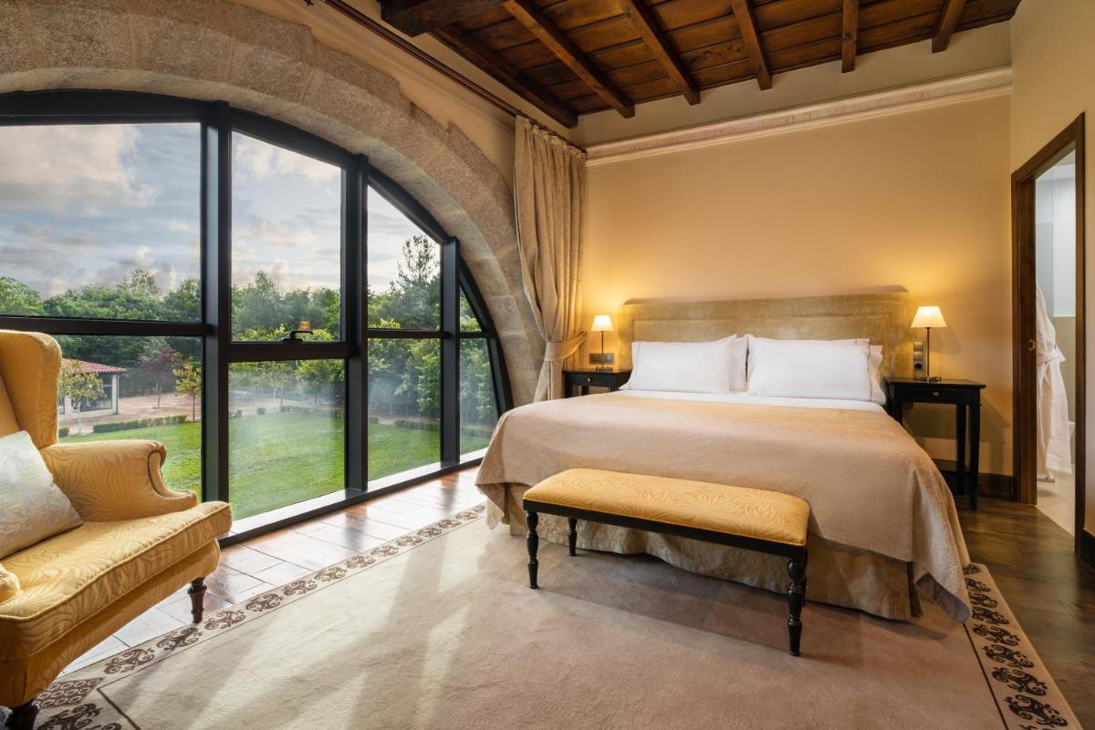 Cama o camas de una habitación en Áurea Palacio de Sober by Eurostars Hotel Company