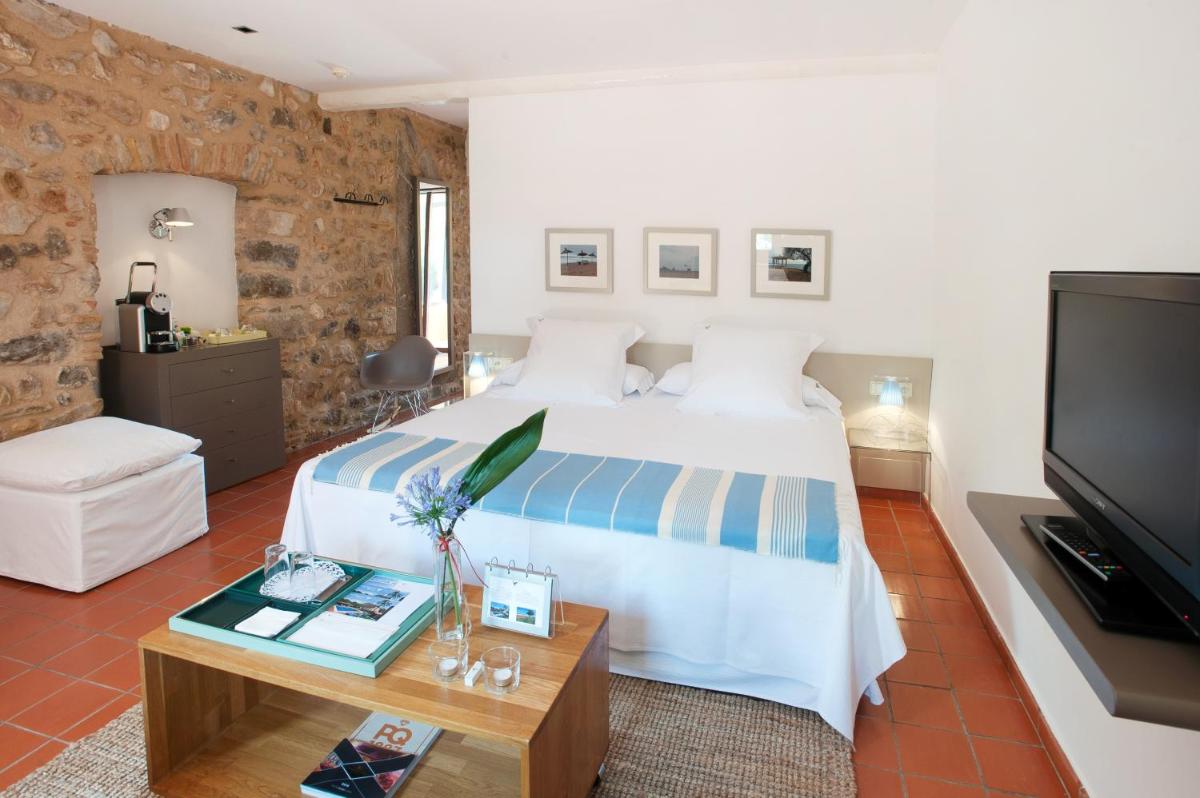 Cama o camas de una habitación en Mas Falgarona Hotel Boutique & SPA