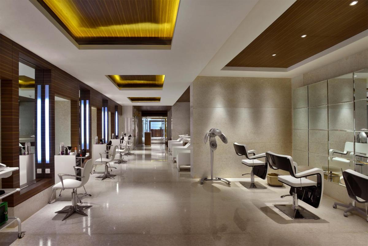 a salon with a row of chairs and desks at The Lalit Chandigarh in Chandīgarh