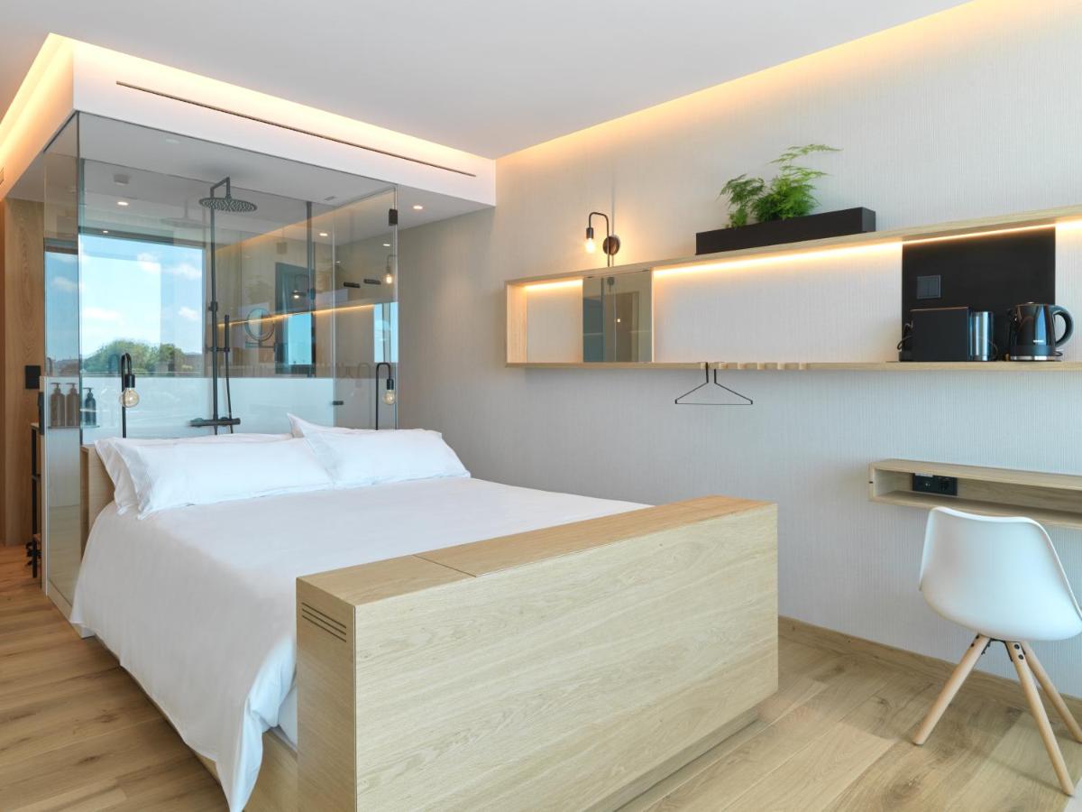 Cama o camas de una habitación en Noa Boutique Hotel