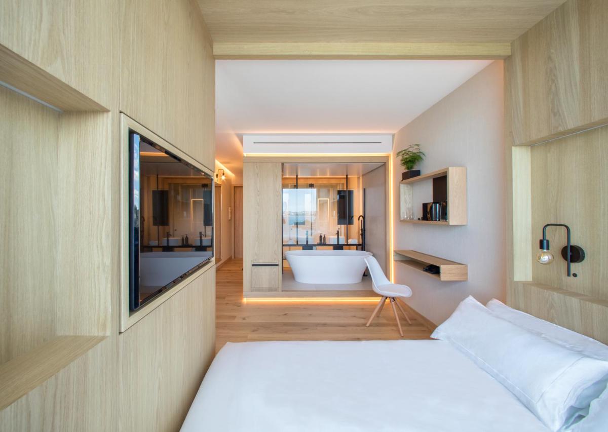 Cama o camas de una habitación en Noa Boutique Hotel