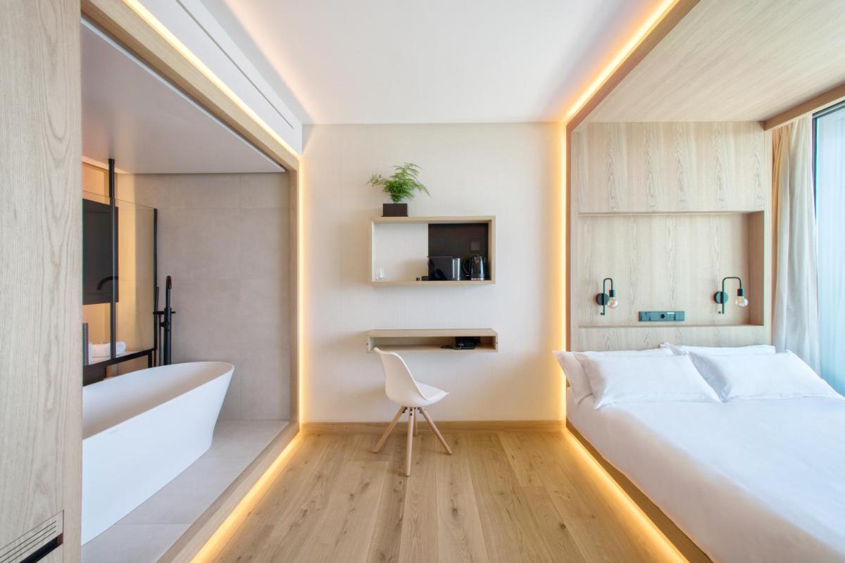 Cama o camas de una habitación en Noa Boutique Hotel