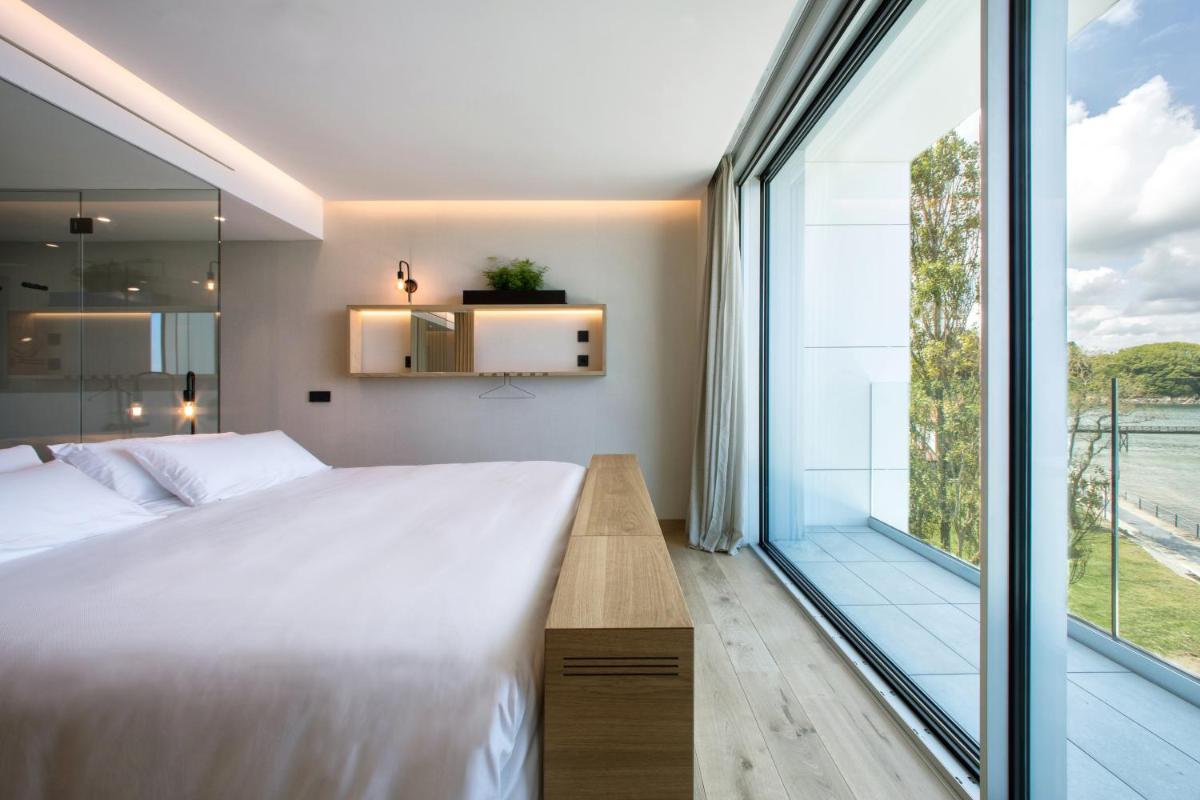 Cama o camas de una habitación en Noa Boutique Hotel