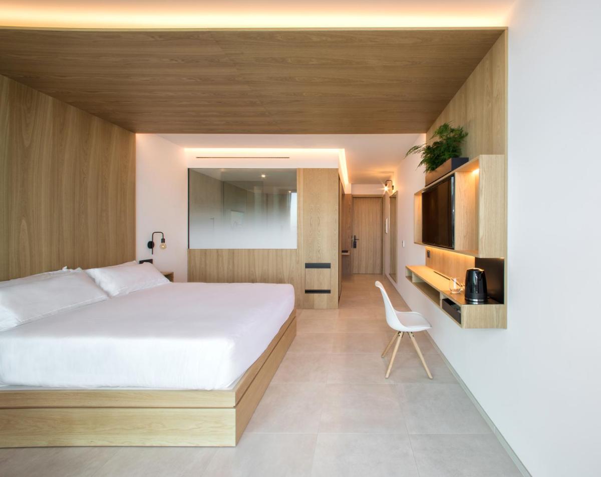 Cama o camas de una habitación en Noa Boutique Hotel