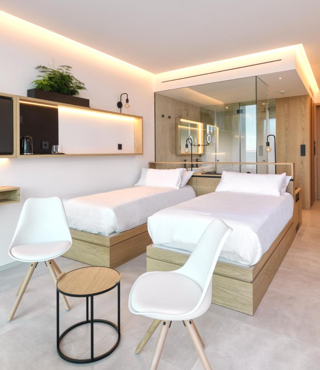 Cama o camas de una habitación en Noa Boutique Hotel