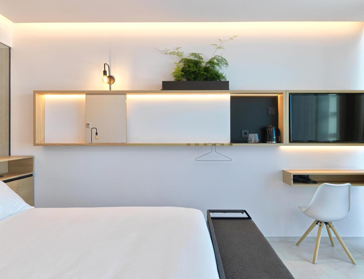 Cama o camas de una habitación en Noa Boutique Hotel