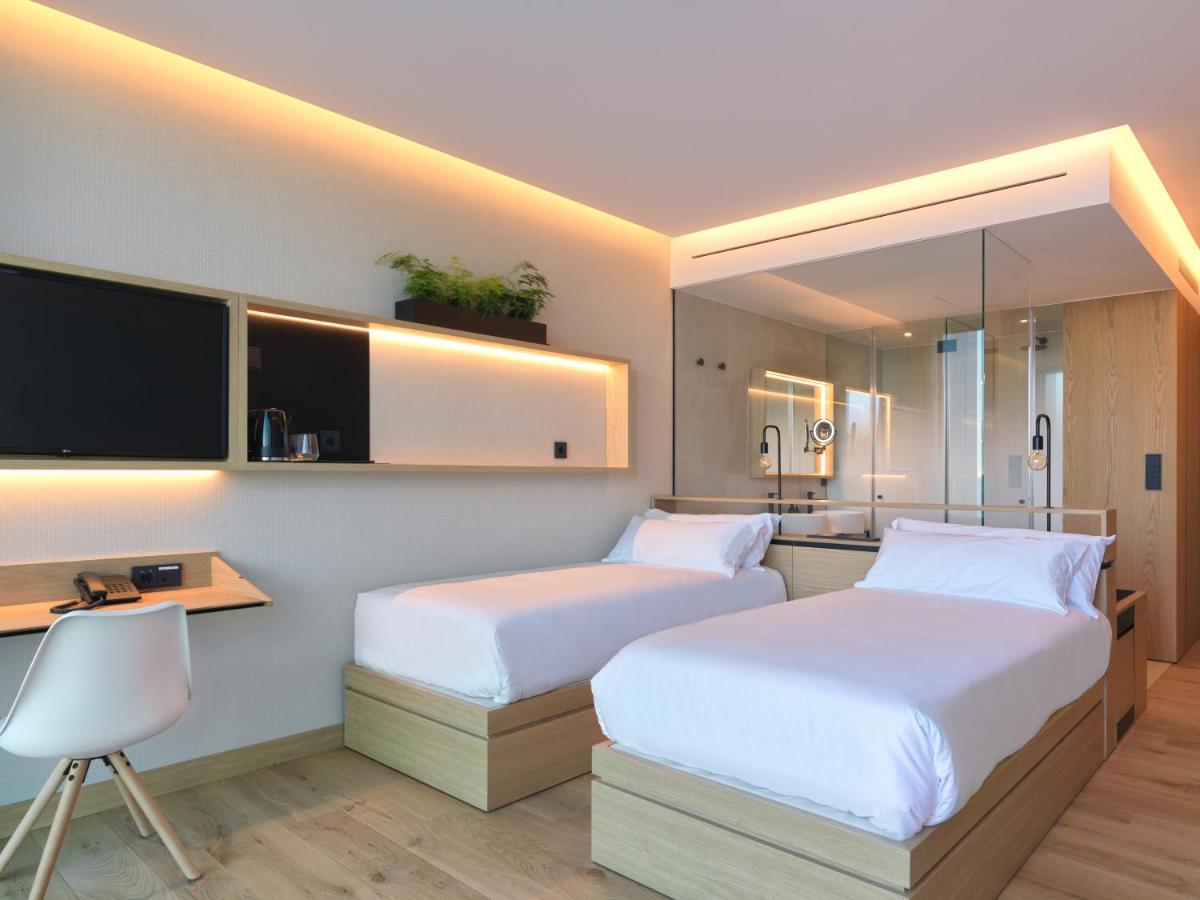 Cama o camas de una habitación en Noa Boutique Hotel