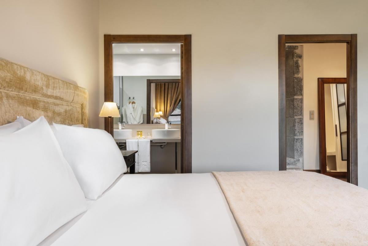 Cama o camas de una habitación en Áurea Palacio de Sober by Eurostars Hotel Company